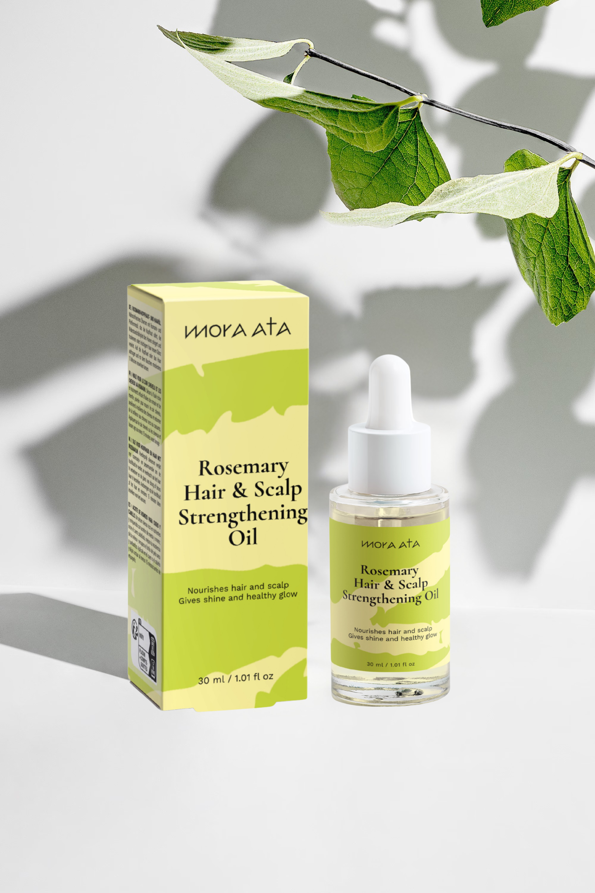 Mora Ata Rosemary Hair and Scalp Strengthening Oil bottle with packaging on a light background